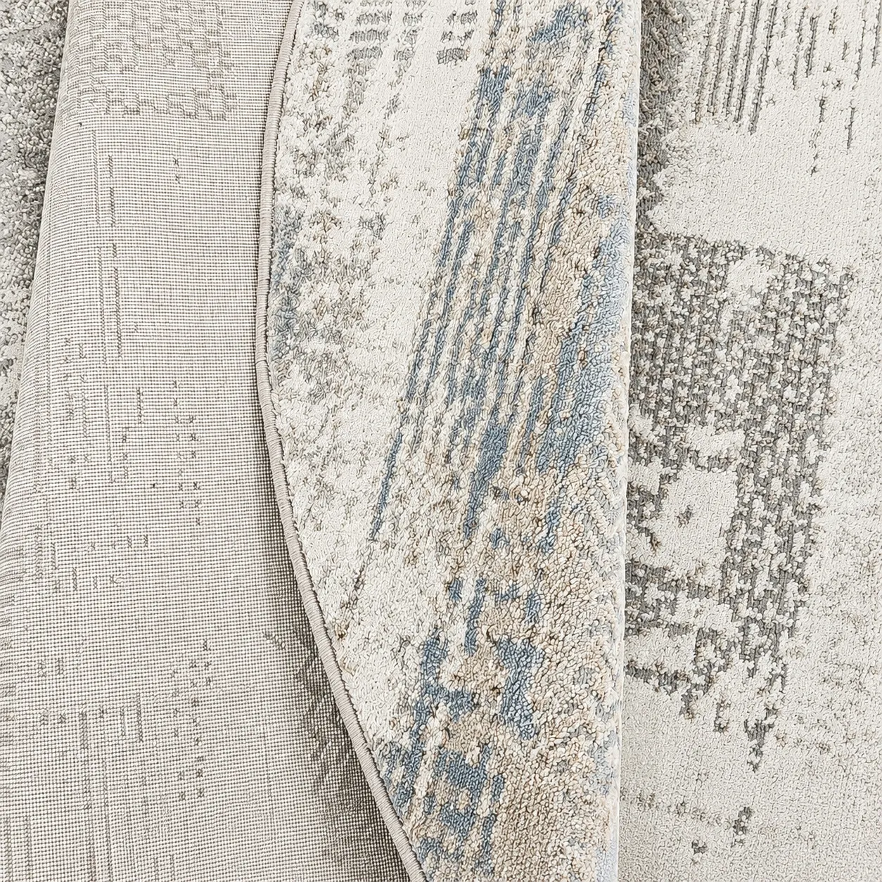Alfombra circular abstracta, Gris azulado, grosor 2 cm, reverso de yute (D160cm)
