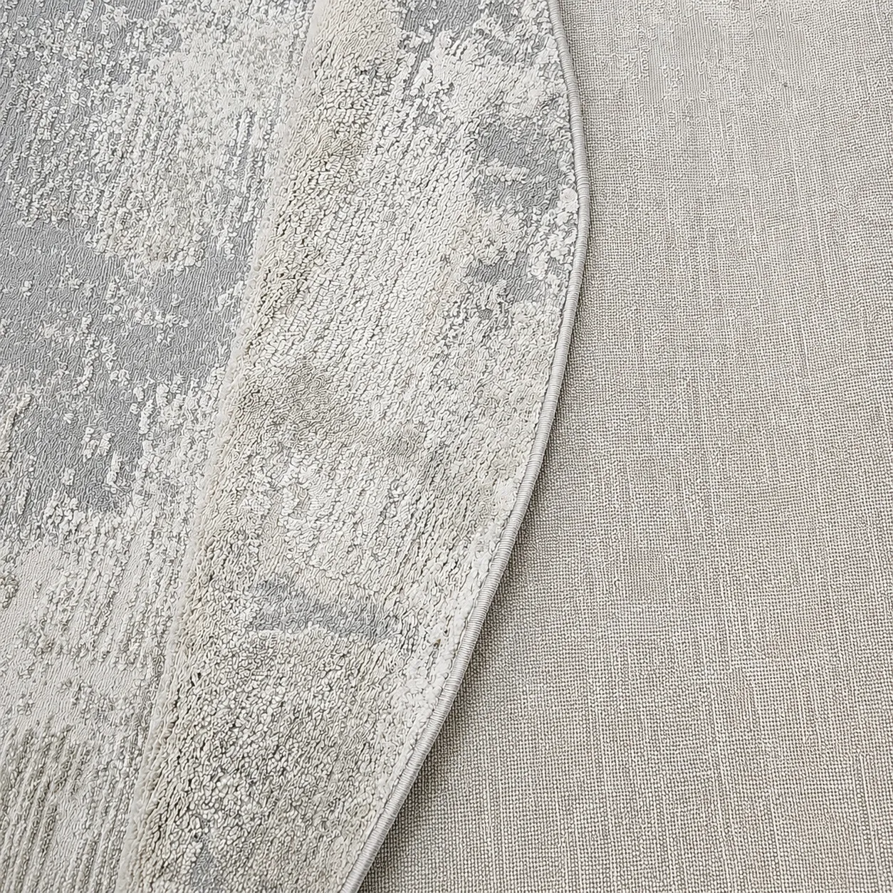 Alfombra circular abstracta moteada, Gris claro, grosor 2 cm, reverso de yute (D160cm)